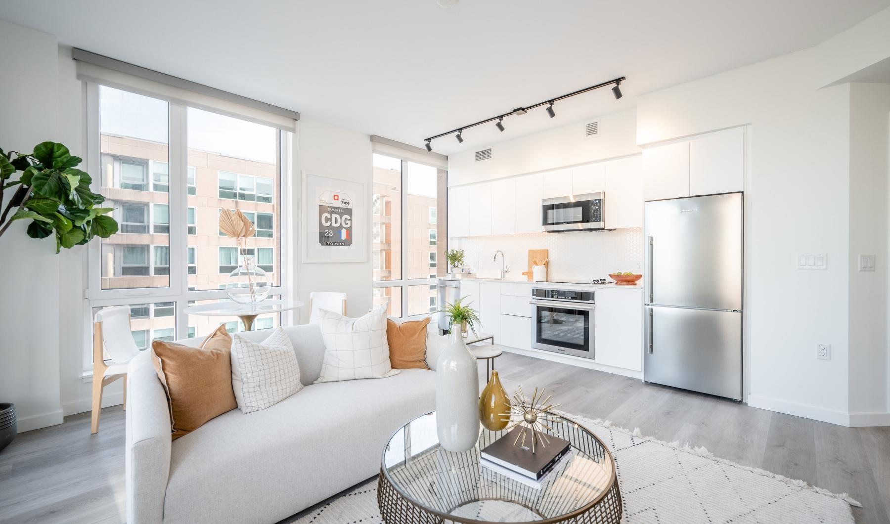 Gorgeous living areas to entertain and enjoy a living room with a couch and a table