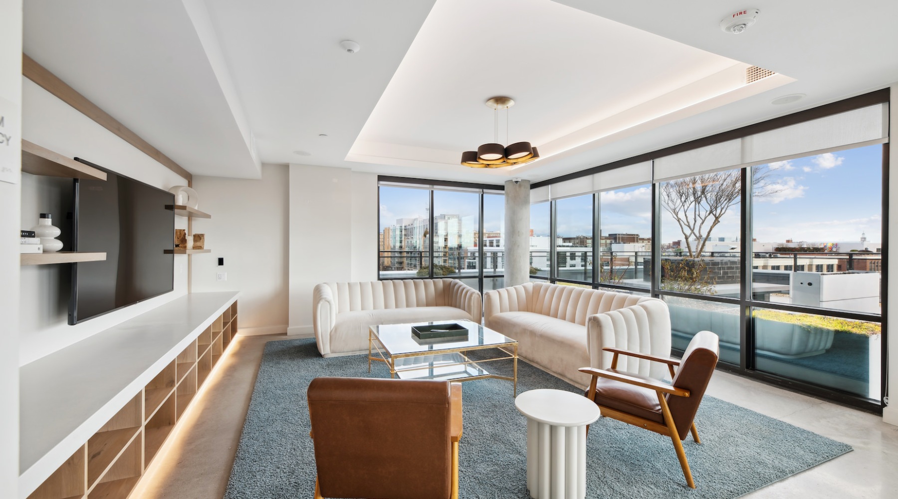 Resident lounge with windows and TV